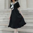 Short-sleeve Contrast Collared A-line Dress