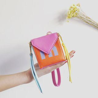 Color Panel Printed Tasseled Clutch
