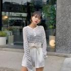 Buttoned-neckline Striped Sheer Knit Top