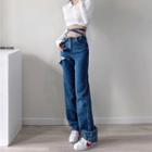 Mid Rise Cross Strap Wide Leg Jeans