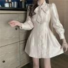 Long-sleeve Bow Accent Mini A-line Dress Almond - One Size