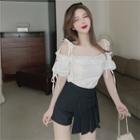 Off-shoulder Ruffled Blouse / Pleated A-line Skort