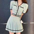 Short-sleeve Contrast Trim Blouse / Mini Pleated Skirt