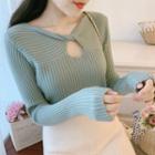 Long-sleeve Cutout Knit Top / Knit A-line Mini Skirt / Set