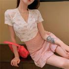 Floral V-neck Cropped T-shirt / Ruffle Hem Mini Skirt