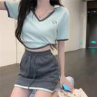 Short-sleeve Lapel Contrast Trim T-shirt / High-waist Drawstring A-line Mini Skirt