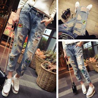 Ripped Patched Slim-fit Jeans