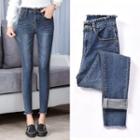 Mid Rise Tassel Trim Skinny Jeans