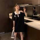 Short-sleeve Floral Print A-line Polo Dress Black - One Size