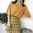 Elbow-sleeve T-shirt / Plaid A-line Skirt