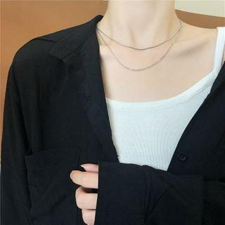 Layered Alloy Choker