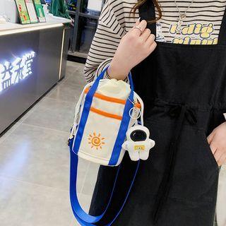 Set: Sun Embroidered Bucket Bag + Bag Charm
