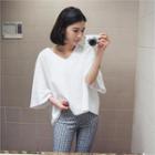 Loose-fit V-neck T-shirt