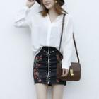 Faux Leather Floral Embroidery Mini Skirt