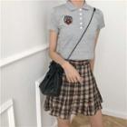 Embroidered Polo Shirt / Plaid Pleated Skirt