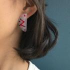 Non-matching Plastic Earring