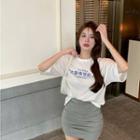 Round-neck Printed Oversize Top / High-waist Plain Pleated Mini Skirt