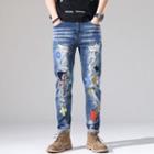 Distressed Embroidered Tapered Jeans