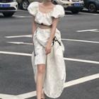 Puff-sleeve Top / Asymmetric Midi Skirt