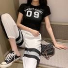 Lettering Short-sleeve T-shirt / Color Block Sweatpants