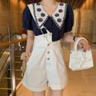 Short-sleeve Floral Embroidered Blouse / Asymmetric Jumper Shorts