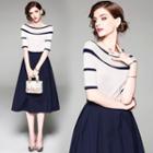 Set: Short-sleeve Knit Top + A-line Midi Skirt