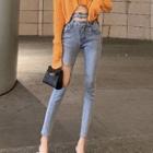 High-waist Ripped Slim-fit Jeans