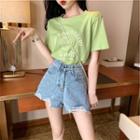 Set: Short-sleeve Lettering T-shirt + Distressed Denim Hot Pants