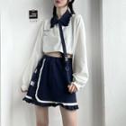 Long-sleeve Polo-collar Cropped Print Top / Ruffle Trim Color-block Short Skirt (various Designs)