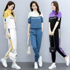 Set: Short-sleeve Letter Embroidered T-shirt + Striped Cropped Harem Pants