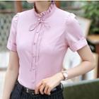Frilled Neck Short-sleeve Shirt / Pinstriped Dress Pants