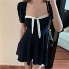 Contrast Trim Short-sleeve Cutout-back Mini A-line Dress As Shown In Figure - One Size