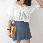 Loose-fit Ruffle Short-sleeve Blouse