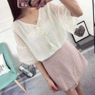 Tasseled Tie Front Elbow Sleeve Top