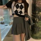 Short-sleeve Argyle Cropped Cardigan / Pleated Mini A-line Skirt