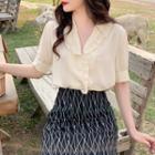 Frilled Short-sleeve Blouse / Pattern Skirt