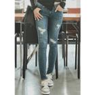 Paint-splattered Distressed Jeans
