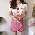 Short-sleeve Floral Knit Top / Mini Plaid A-line Skirt