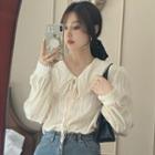 Long-sleeve Peter Pan-collar Embossed Blouse Almond - One Size