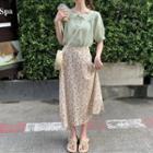 Short-sleeve Buttoned Top / Floral A-line Midi Skirt