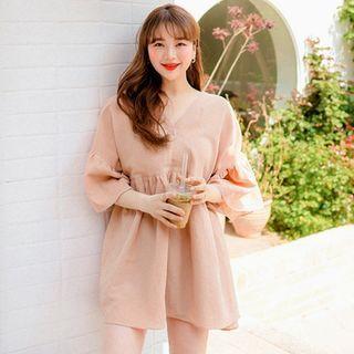 Plus Size V-neck Ruffle-hem Top