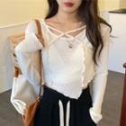 Long-sleeve Asymmetrical Hem Criss-cross Crop Top