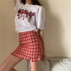 Short-sleeve Printed T-shirt / Plaid Mini Fitted Skirt