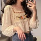Long-sleeve Floral Embroidered Knit Panel Cropped Blouse Almond - One Size
