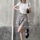 Short-sleeve Button-up Knit Top / Plaid Mini Pleated Skirt