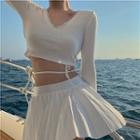 Long-sleeve Open Back Strappy Cropped T-shirt / Mini Pleated Skirt