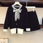 Two-tone Lace Bow Sweater / Mini A-line Pleated Skirt / Set