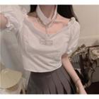 Set: Puff-sleeve Choker-neck Blouse + Pleated Mini A-line Skirt