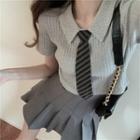 Short-sleeve Ribbed Knit Top / High-waist Pleated Skirt