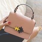 Puzzle Detailed Crossbody Bag